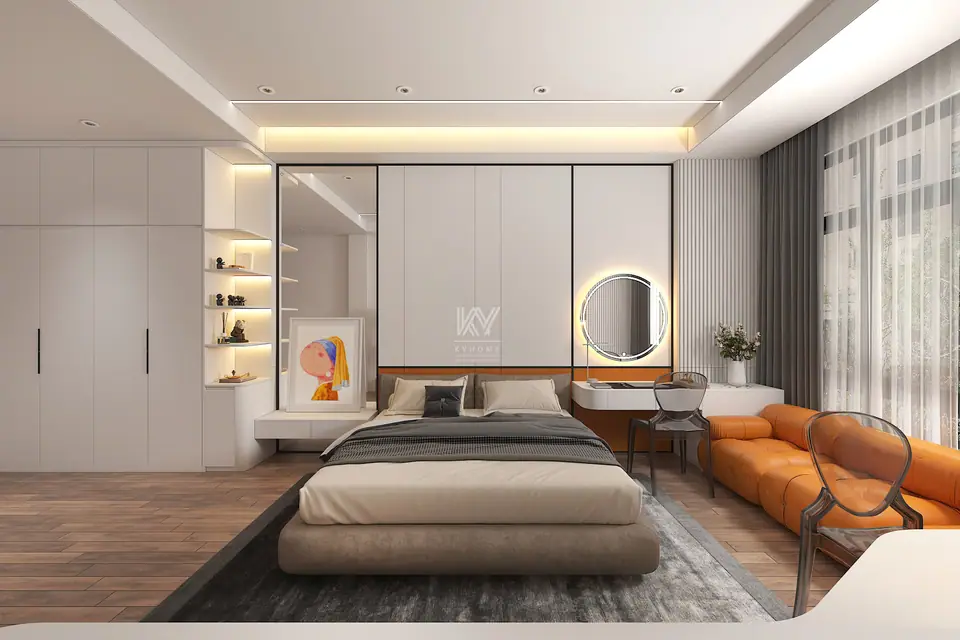 Phòng ngủ tông trắng với giường bọc nỉ, sofa da cam và gương tròn đèn LED