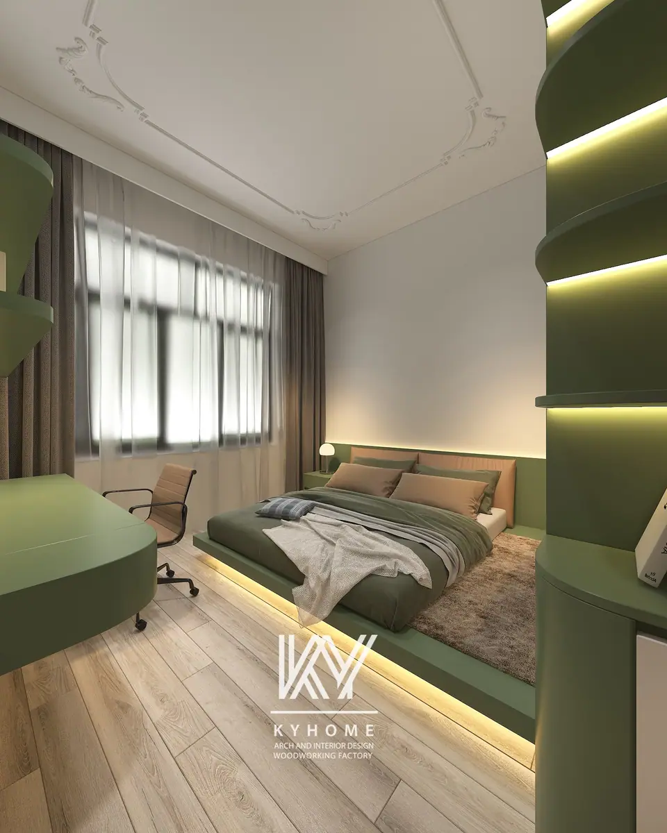Bàn làm việc bo cong xanh rêu cạnh kệ cong đèn LED và giường bệt